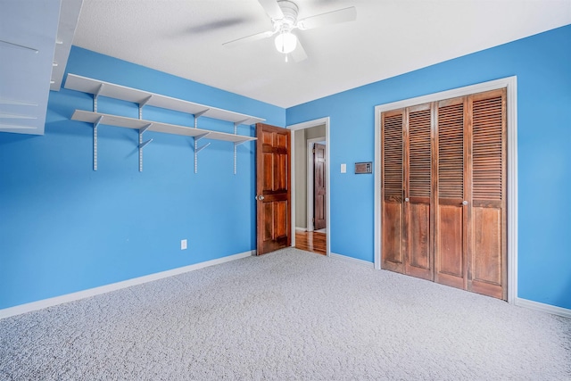 4204 Fox Hill Rd, North Little Rock, AR 72116 - unfurnished bedroom with carpet flooring, baseboards, a closet, and ceiling fan