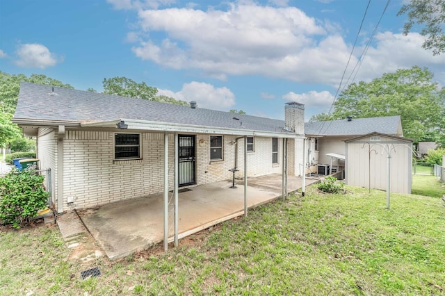 4204 Fox Hill Rd, North Little Rock, AR 72116 - back of house featuring a patio, brick siding, a chimney, and central air condition unit