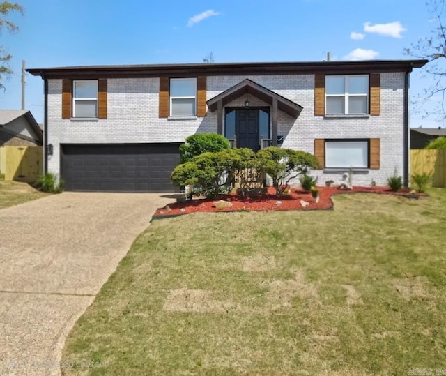 7 Buttermilk Rd, Little Rock, AR 72227 - view of front facade featuring brick siding, an attached garage, and driveway