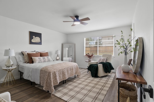 7 Buttermilk Rd, Little Rock, AR 72227 - bedroom with wood finished floors, ceiling fan, and baseboards