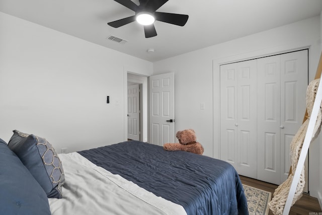 7 Buttermilk Rd, Little Rock, AR 72227 - bedroom with wood finished floors, a ceiling fan, and a closet