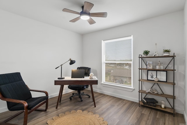 7 Buttermilk Rd, Little Rock, AR 72227 - home office featuring baseboards, wood finished floors, and ceiling fan