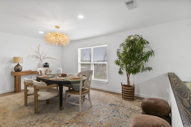 7 Buttermilk Rd, Little Rock, AR 72227 - dining room featuring wood finished floors, a chandelier, baseboards, and recessed lighting