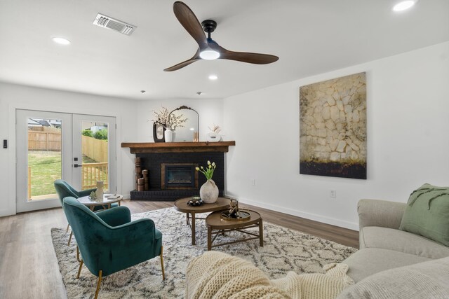 7 Buttermilk Rd, Little Rock, AR 72227 - living room featuring french doors, wood finished floors, recessed lighting, a ceiling fan, and baseboards