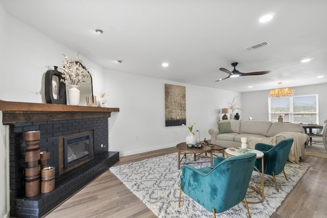 7 Buttermilk Rd, Little Rock, AR 72227 - living area with ceiling fan, wood finished floors, recessed lighting, a fireplace, and baseboards