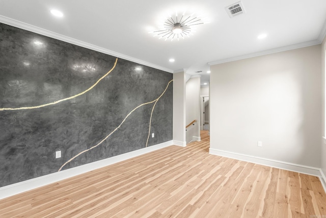 empty room with wood finished floors, baseboards, recessed lighting, and ornamental molding