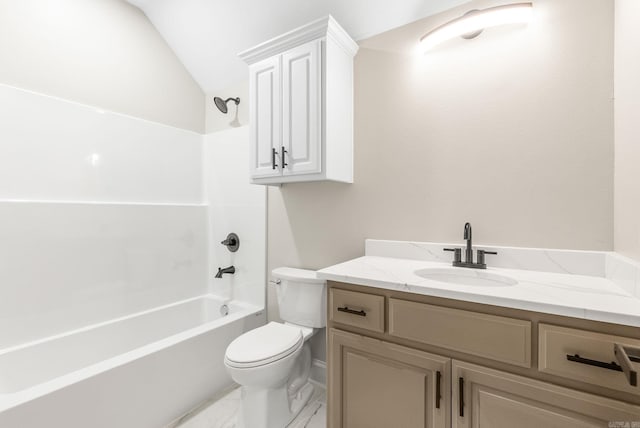 bathroom featuring toilet, lofted ceiling, vanity, and shower / bathtub combination