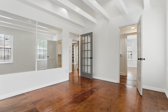 1810 S Pierce St, Little Rock, AR 72204 - unfurnished room featuring french doors, wood finished floors, baseboards, and beamed ceiling