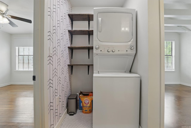 1810 S Pierce St, Little Rock, AR 72204 - laundry area with stacked washer / drying machine, ceiling fan, baseboards, and wood finished floors