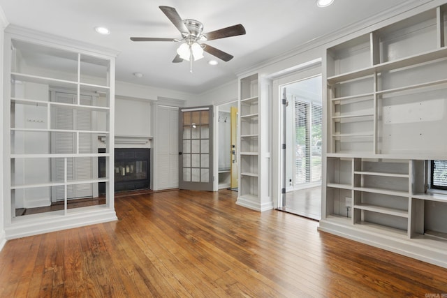 1810 S Pierce St, Little Rock, AR 72204 - unfurnished living room with ceiling fan, ornamental molding, hardwood / wood-style flooring, a glass covered fireplace, and recessed lighting