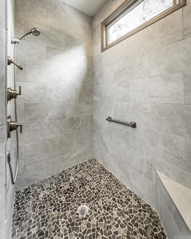 43 Mikes Cir, Heber Springs, AR 72543 - full bathroom with tiled shower and stone finish floors