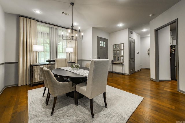 43 Mikes Cir, Heber Springs, AR 72543 - dining space with dark wood finished floors, a chandelier, baseboards, and recessed lighting