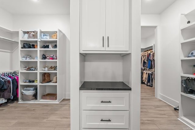 67 Falstone Dr, Little Rock, AR 72223 - walk in closet featuring light wood-type flooring