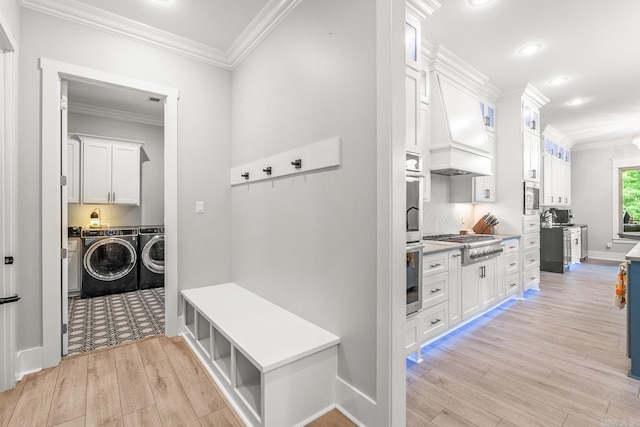 67 Falstone Dr, Little Rock, AR 72223 - mudroom featuring independent washer and dryer, crown molding, light wood-style floors, recessed lighting, and baseboards