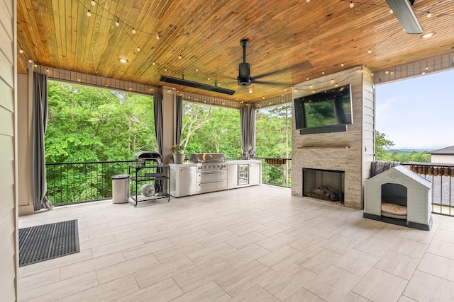 67 Falstone Dr, Little Rock, AR 72223 - view of patio / terrace with a fireplace and ceiling fan