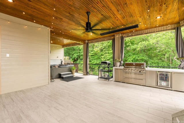 67 Falstone Dr, Little Rock, AR 72223 - view of patio / terrace with a hot tub, wine cooler, ceiling fan, and a deck
