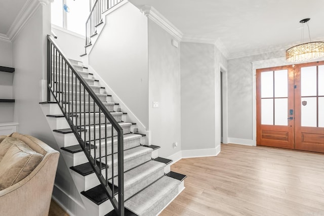 67 Falstone Dr, Little Rock, AR 72223 - entryway featuring stairway, crown molding, light wood-type flooring, and baseboards