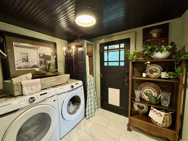 2645 Jumbo Rd, Melbourne, AR 72556 - washroom featuring marble look tiles and washing machine and clothes dryer