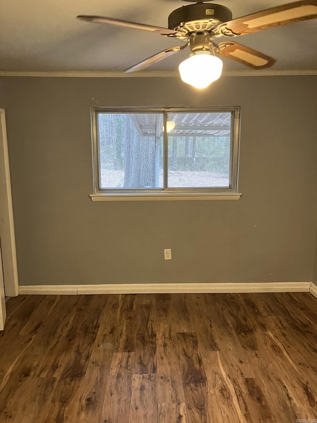 5006 Manor Ave, Little Rock, AR 72204 - spare room featuring crown molding, baseboards, a ceiling fan, and wood finished floors