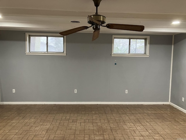 5006 Manor Ave, Little Rock, AR 72204 - spare room with brick patterned floors, baseboards, ceiling fan, and recessed lighting