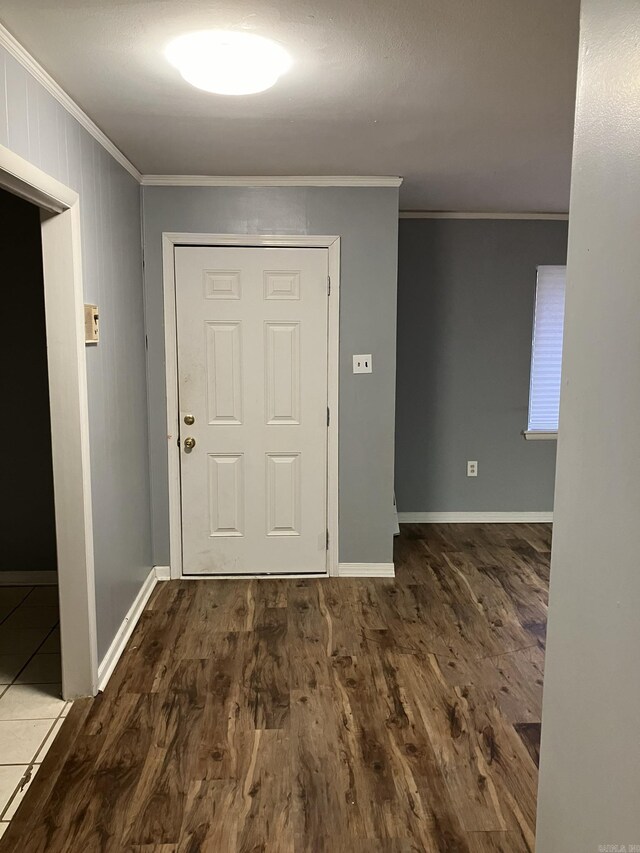 5006 Manor Ave, Little Rock, AR 72204 - foyer entrance featuring ornamental molding, wood finished floors, and baseboards