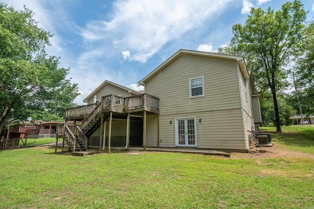 206 Brown, Hot Springs, AR 71913 - back of property with a wooden deck, stairs, french doors, and central AC