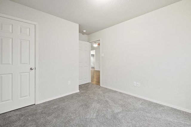 6096 Saddle Hill Dr, Alexander, AR 72002 - unfurnished bedroom featuring carpet floors and baseboards