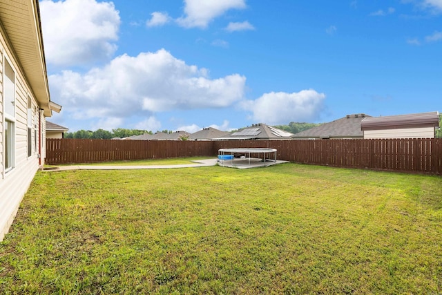 6096 Saddle Hill Dr, Alexander, AR 72002 - view of yard featuring a trampoline and a patio