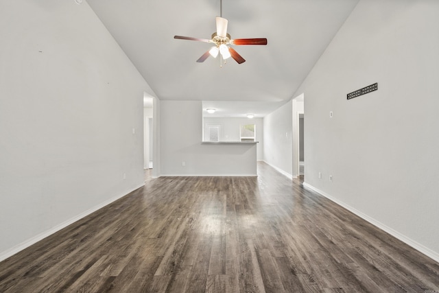 6096 Saddle Hill Dr, Alexander, AR 72002 - unfurnished living room with lofted ceiling, ceiling fan, dark wood-style flooring, and baseboards