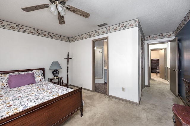 817 Ouachita Pl, Little Rock, AR 72205 - bedroom with light carpet, a textured ceiling, baseboards, connected bathroom, and ceiling fan