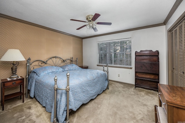 817 Ouachita Pl, Little Rock, AR 72205 - bedroom with ornamental molding, a closet, carpet floors, baseboards, and a ceiling fan