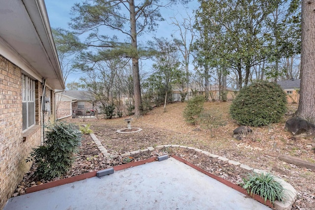 817 Ouachita Pl, Little Rock, AR 72205 - fenced backyard featuring a patio