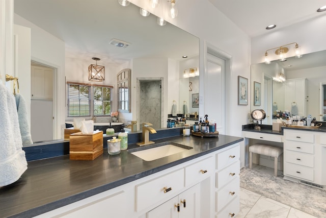 4501 Ridgefield Ln, Little Rock, AR 72223 - full bath with vanity, a walk in shower, marble look tiles, and recessed lighting