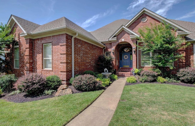 9 Lanes End, Little Rock, AR 72223 - traditional home featuring brick siding, a shingled roof, and a front lawn