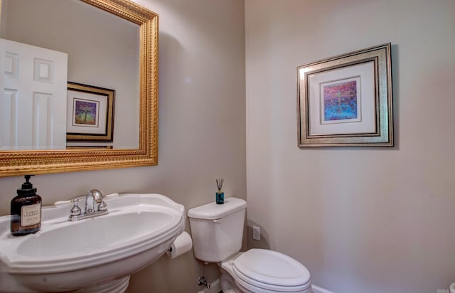 9 Lanes End, Little Rock, AR 72223 - half bath with a sink, toilet, and baseboards