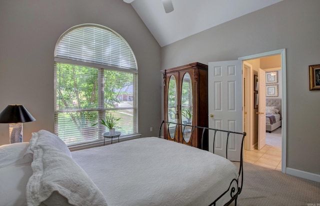 9 Lanes End, Little Rock, AR 72223 - bedroom with light colored carpet, ceiling fan, light tile patterned floors, and high vaulted ceiling