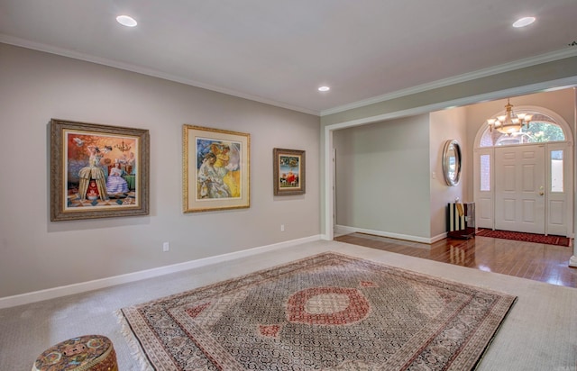 9 Lanes End, Little Rock, AR 72223 - carpeted foyer with a chandelier, crown molding, baseboards, and recessed lighting
