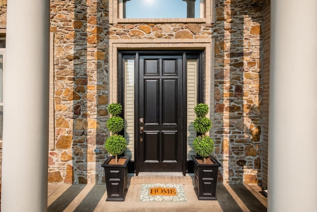22 Epernay Cir, Little Rock, AR 72223 - doorway to property with stone siding