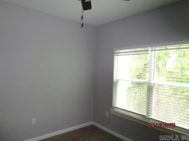 3122 Main St, Little Rock, AR 72206 - unfurnished room featuring a ceiling fan, plenty of natural light, and baseboards