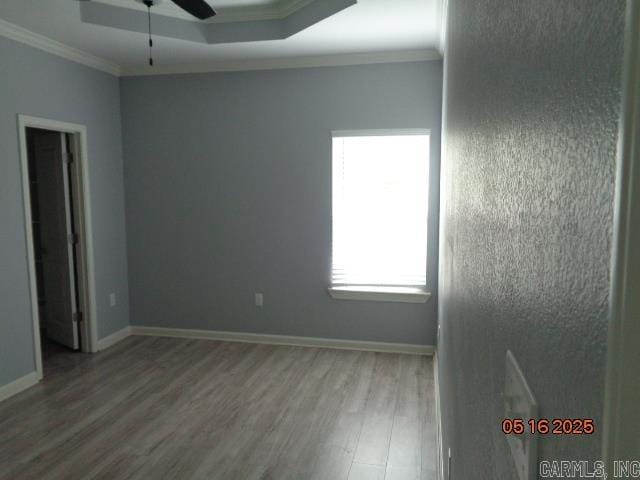 3122 Main St, Little Rock, AR 72206 - empty room with ornamental molding, wood finished floors, a ceiling fan, and baseboards