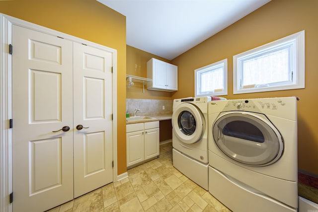 505 E Tri Lks, Horseshoe Bend, AR 72512 - laundry room with independent washer and dryer, cabinet space, and light stone finish floors