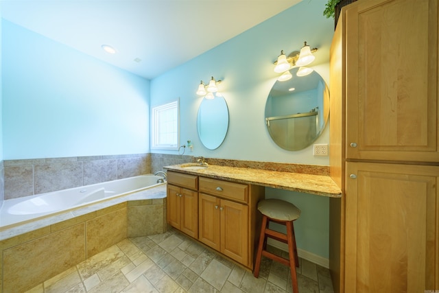 505 E Tri Lks, Horseshoe Bend, AR 72512 - bathroom featuring vanity and a garden tub