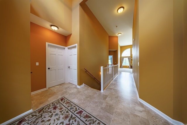 505 E Tri Lks, Horseshoe Bend, AR 72512 - hallway with an upstairs landing and baseboards