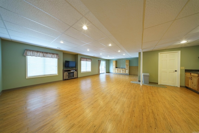 505 E Tri Lks, Horseshoe Bend, AR 72512 - unfurnished living room with light wood-style floors, recessed lighting, and baseboards