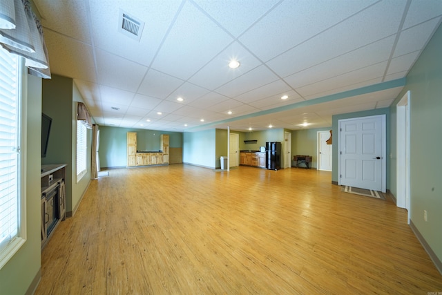 505 E Tri Lks, Horseshoe Bend, AR 72512 - unfurnished living room with light wood-style flooring, recessed lighting, and baseboards