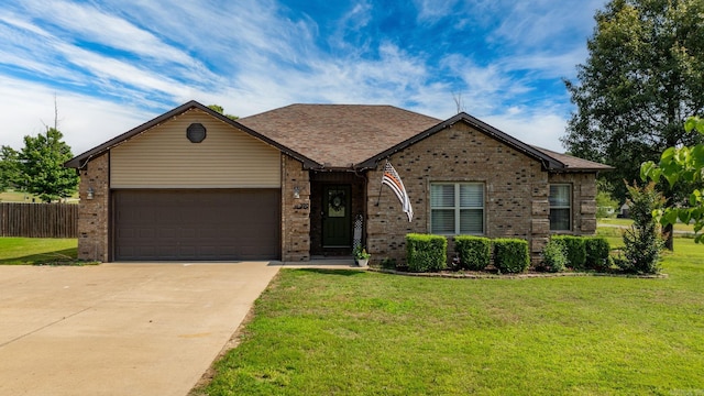 390 Bobwhite Cir, Lonoke, AR 72086 - view of front facade with concrete driveway, brick siding, and a garage