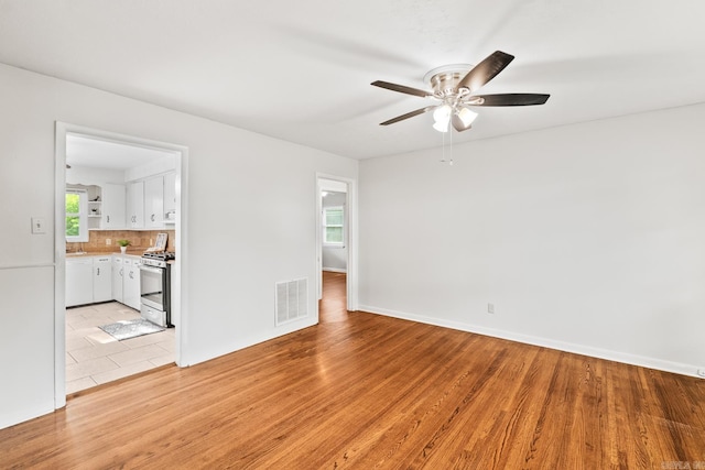 104 Parkview Dr, North Little Rock, AR 72118 - unfurnished room featuring a ceiling fan, light wood-type flooring, and baseboards