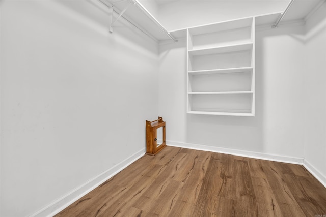 57 Deerfield Dr, Plumerville, AR 72127 - spacious closet with wood finished floors