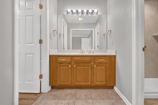 57 Deerfield Dr, Plumerville, AR 72127 - bathroom with vanity and baseboards