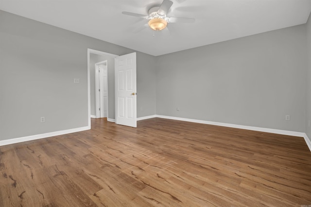 57 Deerfield Dr, Plumerville, AR 72127 - spare room with a ceiling fan and wood finished floors